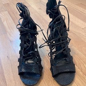 Laced up snake skin heels